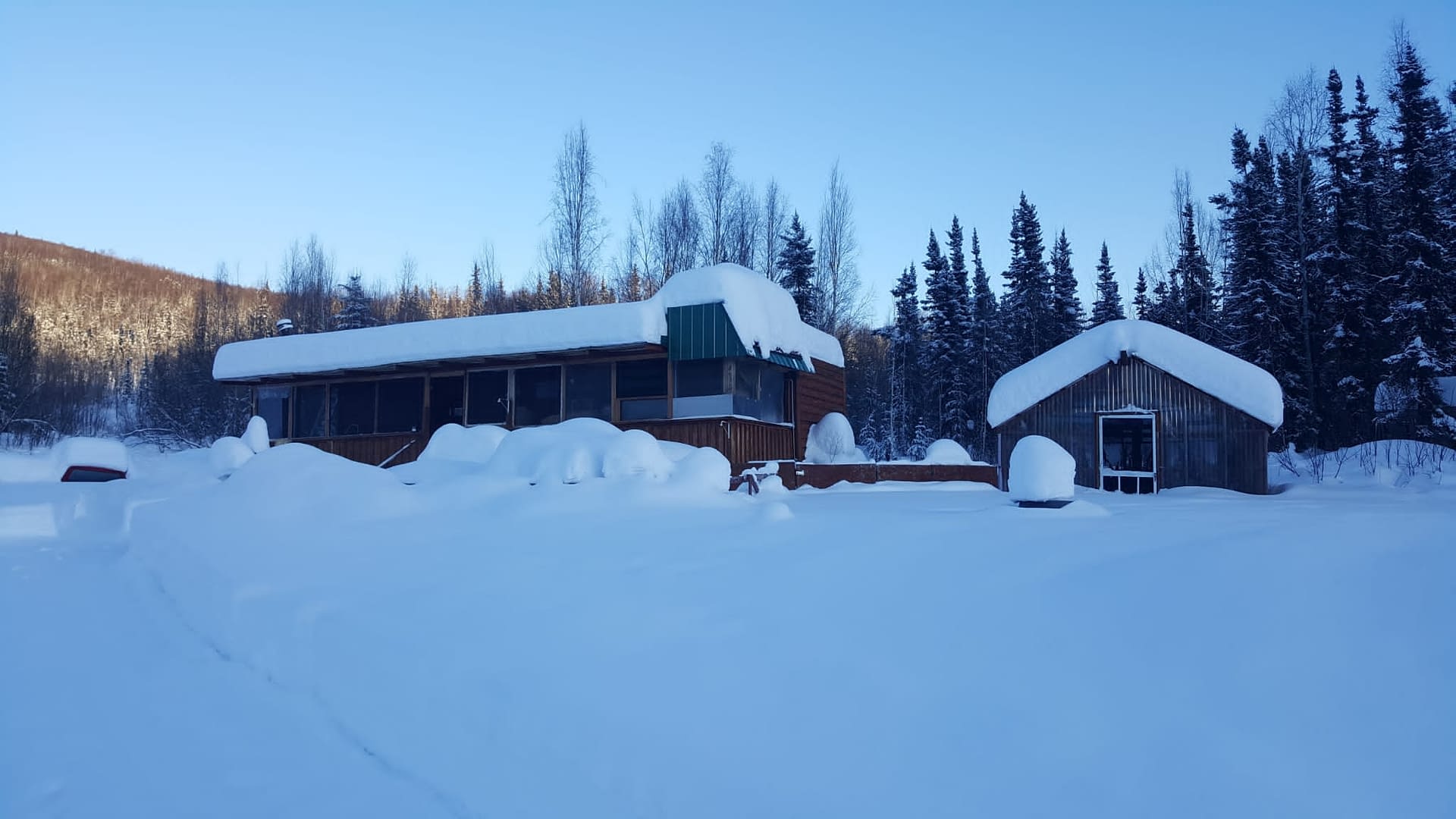 Over 11 Acres Near Fairbanks with Livable Year Round Structures